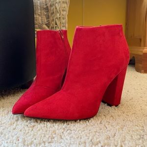 Heeled hot red booties.